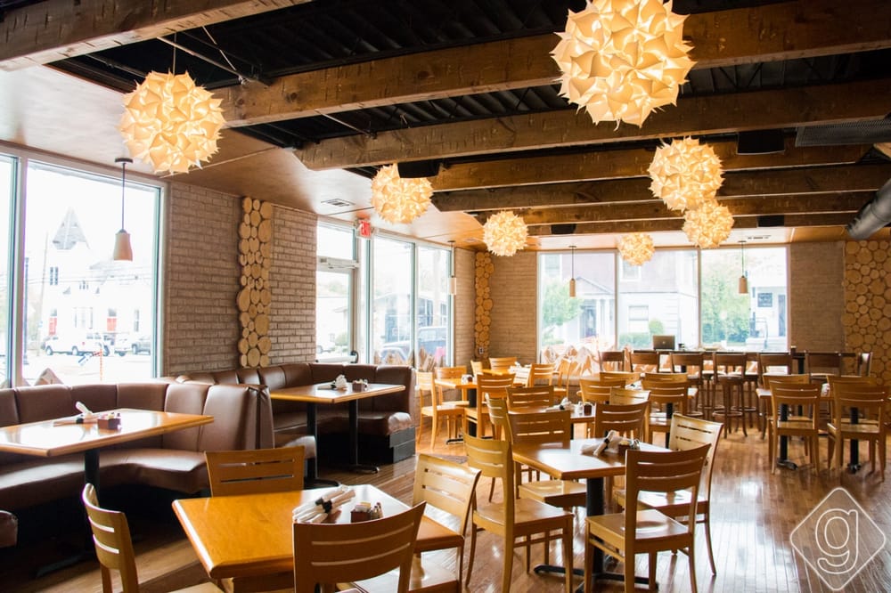 a restaurant with tables and chairs