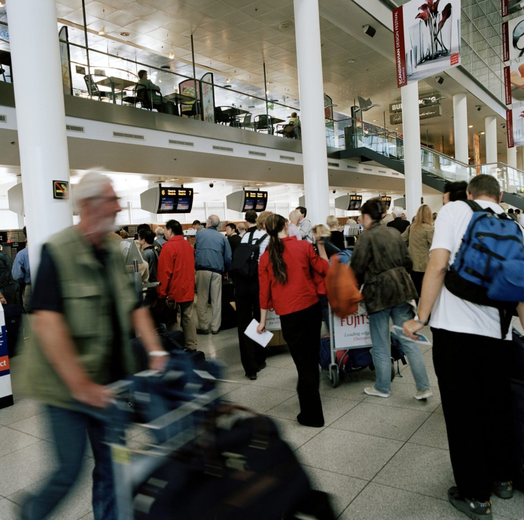 a group of people in an airport