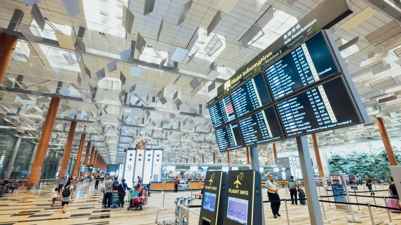 a group of people in an airport