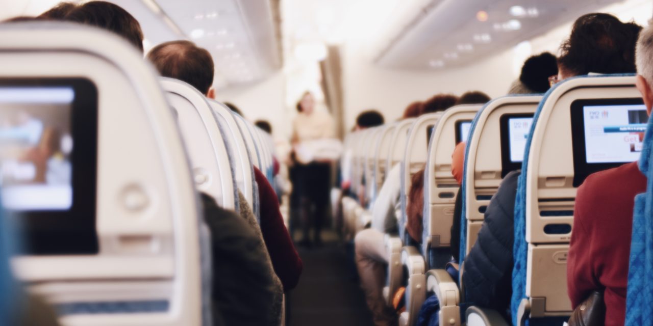 Dr. Fauci, CDC express concern as airlines start selling middle seats again