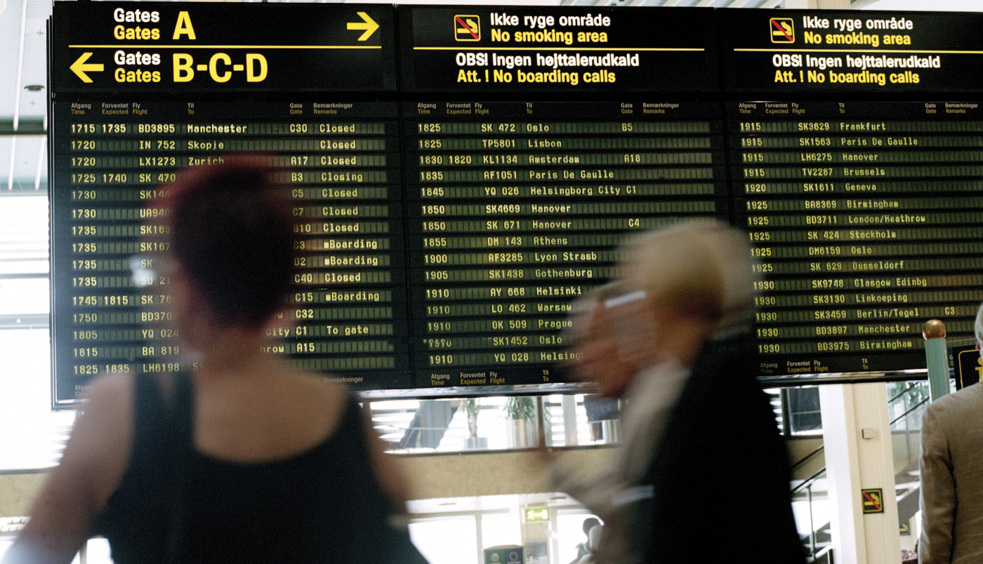 a group of people in an airport