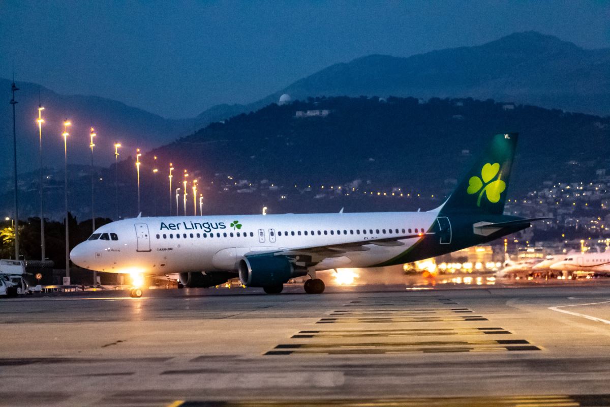 an airplane on a runway at night