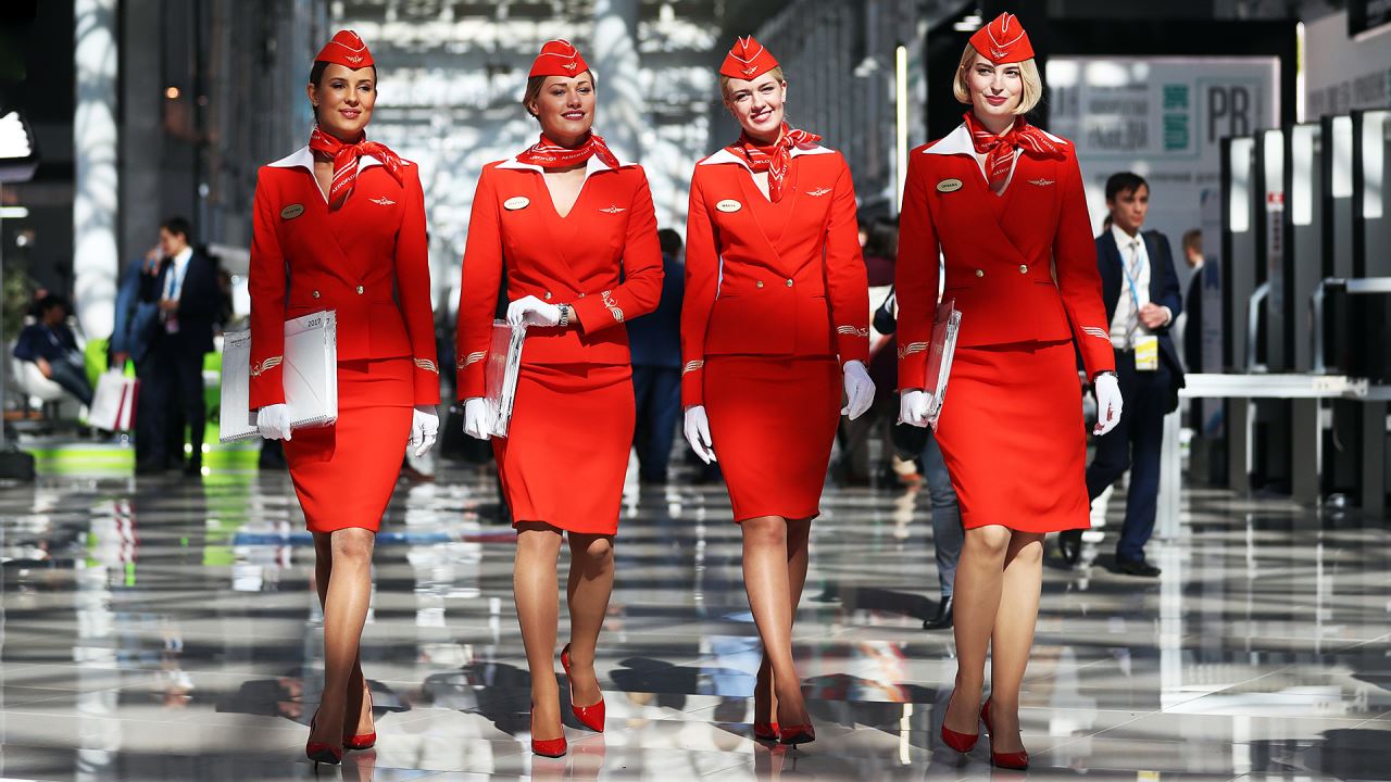 a group of women wearing red uniforms