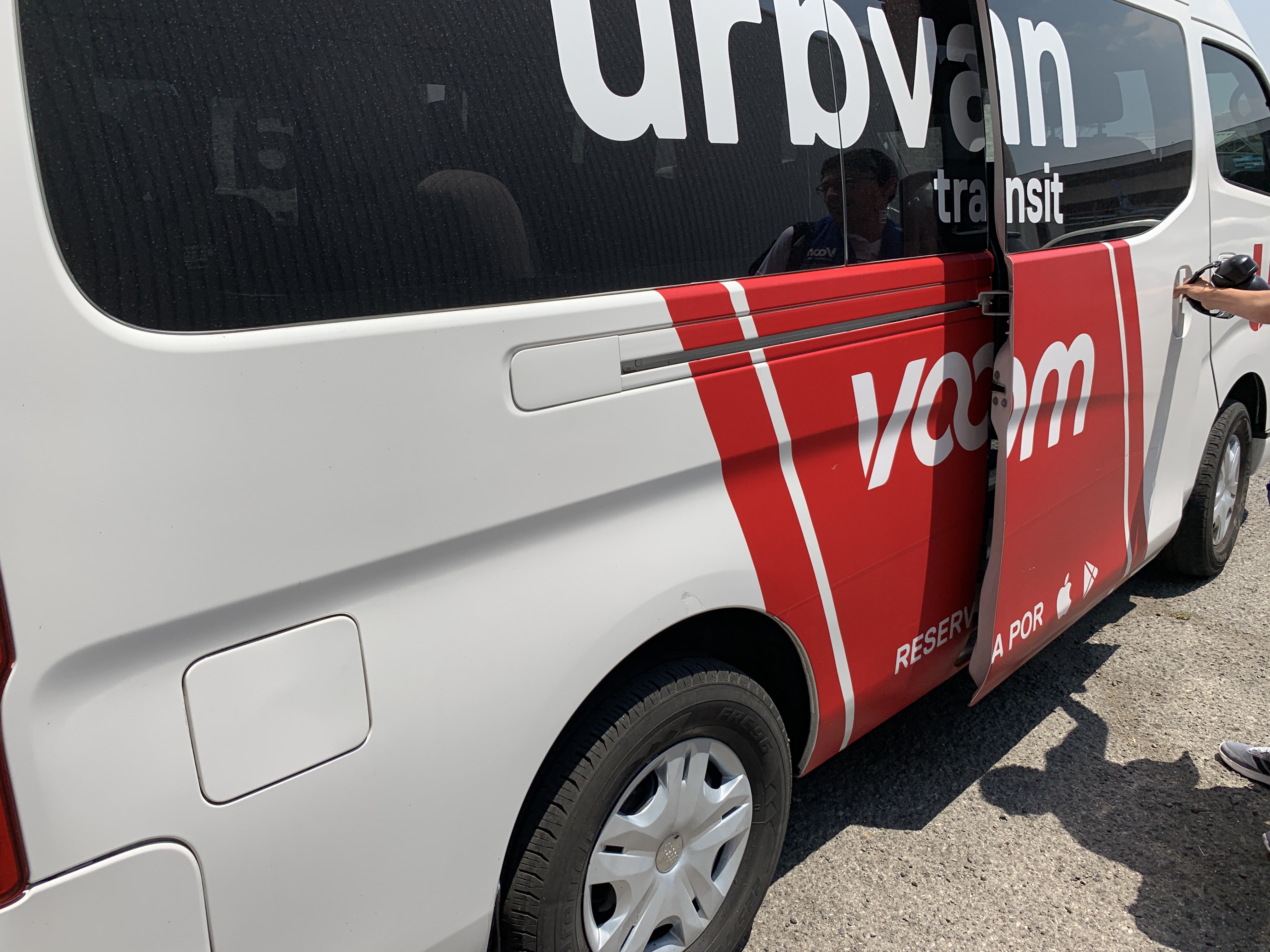 a white van with red and white text on the side