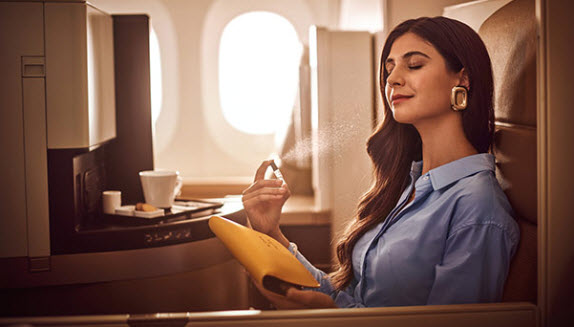 a woman sitting in an airplane