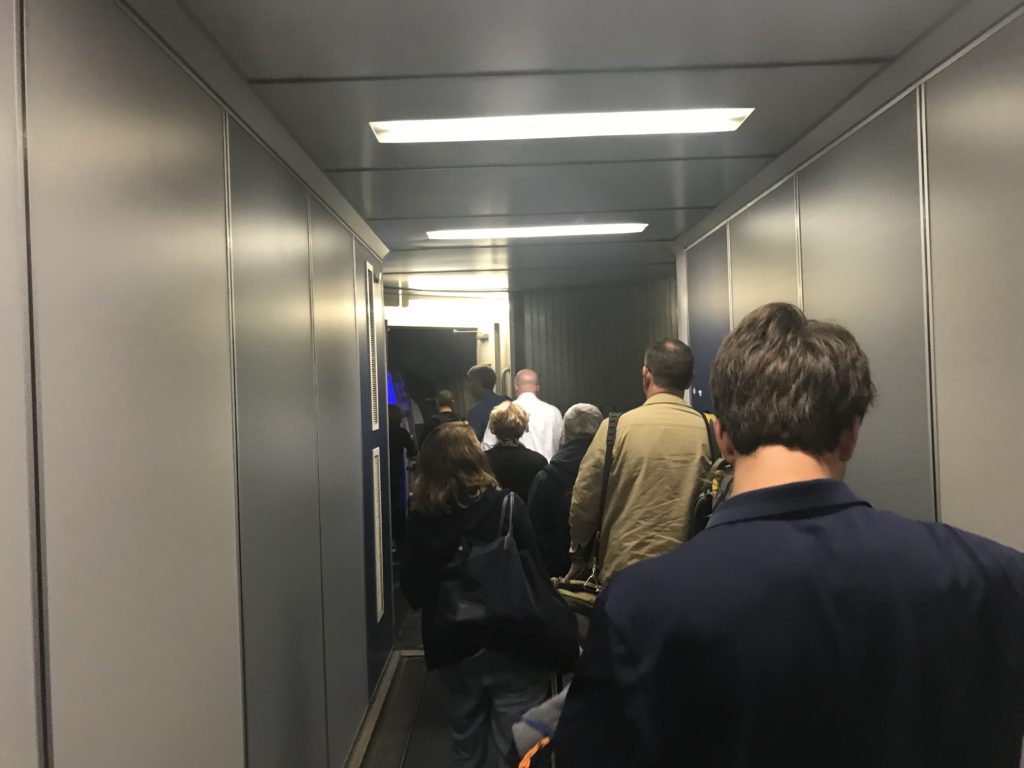 a group of people in a hallway