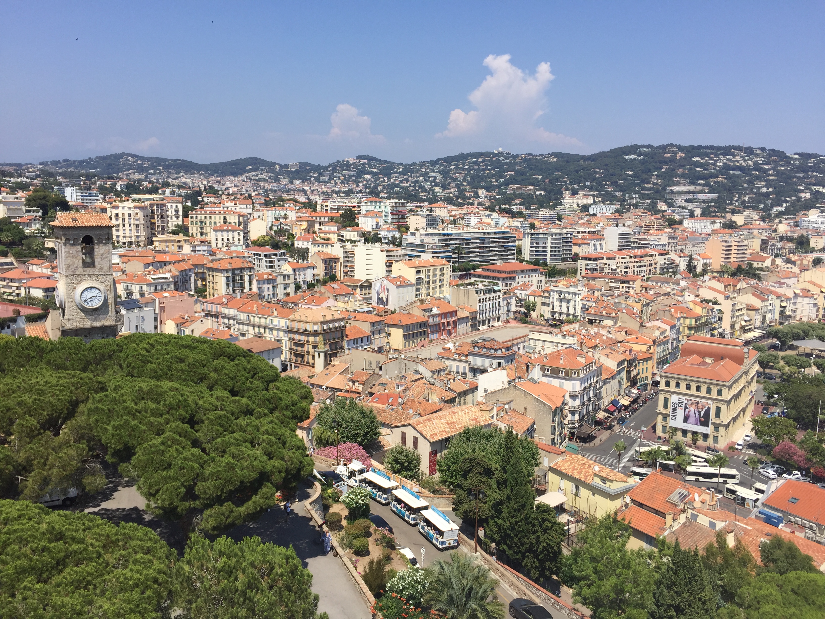 a city with many buildings and trees