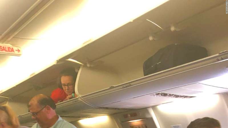 Why a Southwest Flight Attendant welcomed passengers from an overhead bin