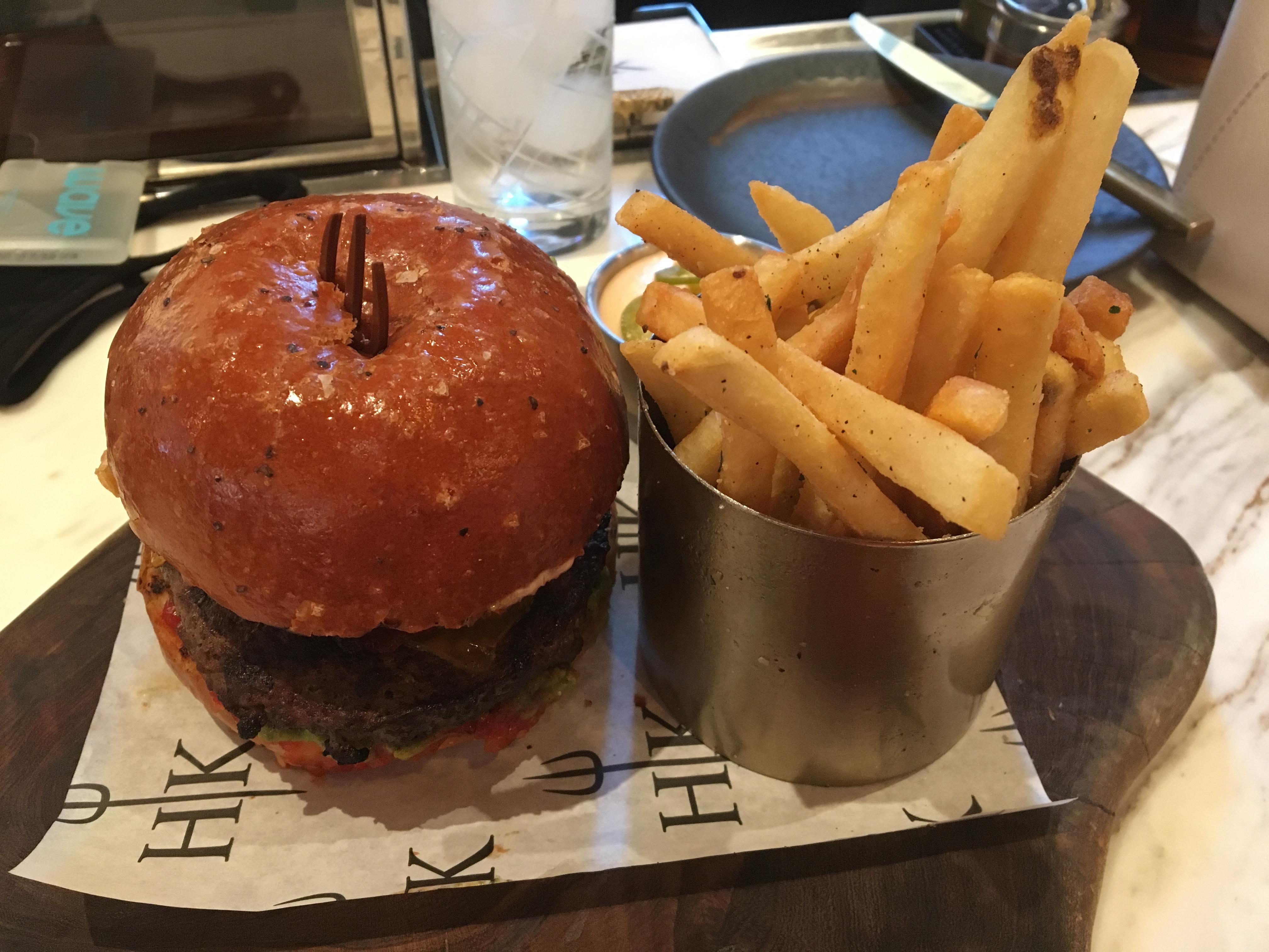 a burger and fries on a plate