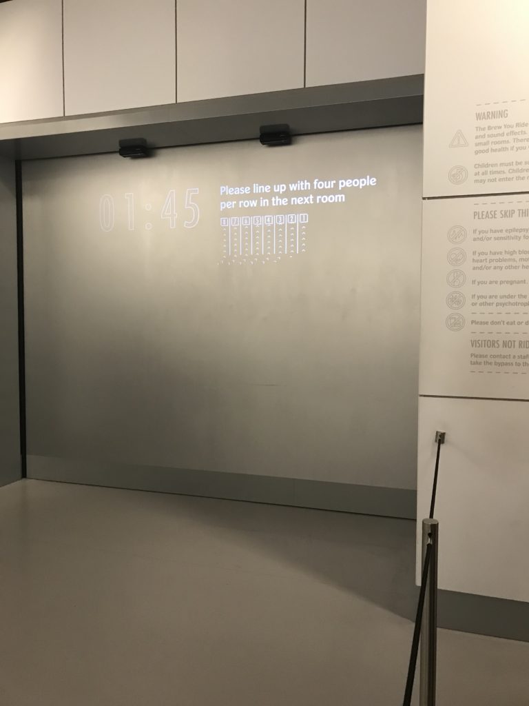 a white wall with a screen on it