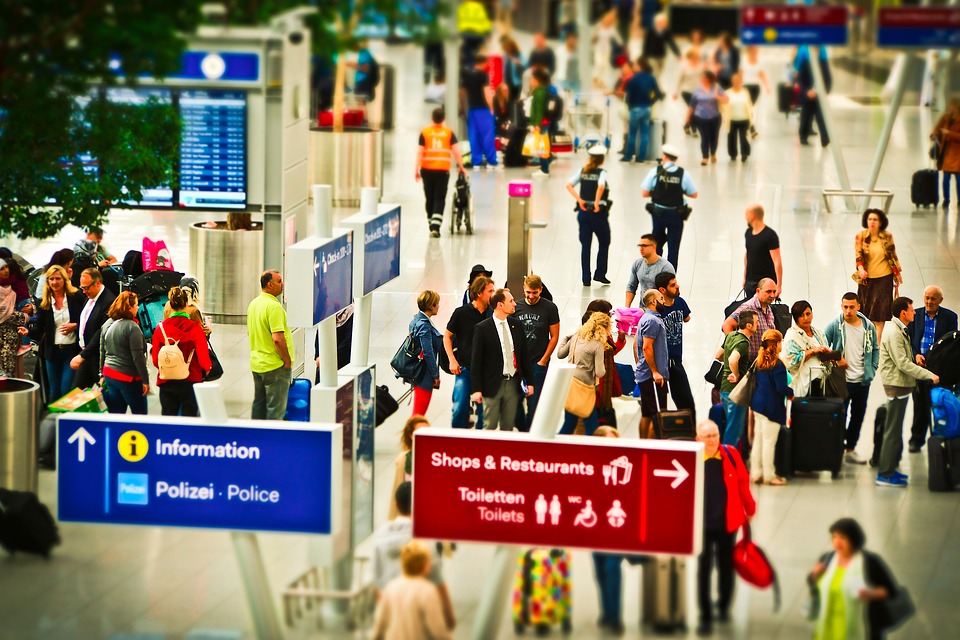 a group of people in an airport