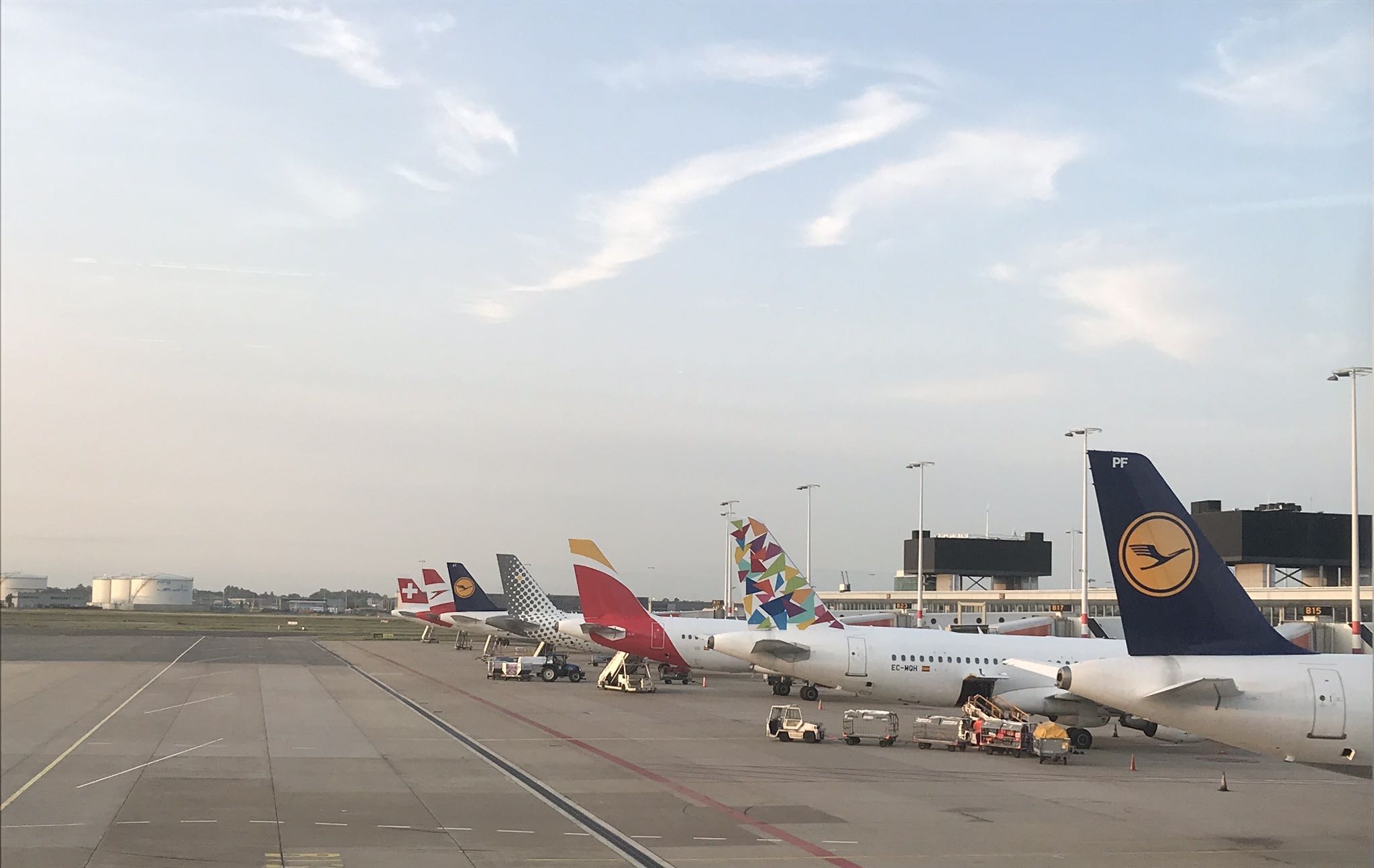 airplanes parked at an airport