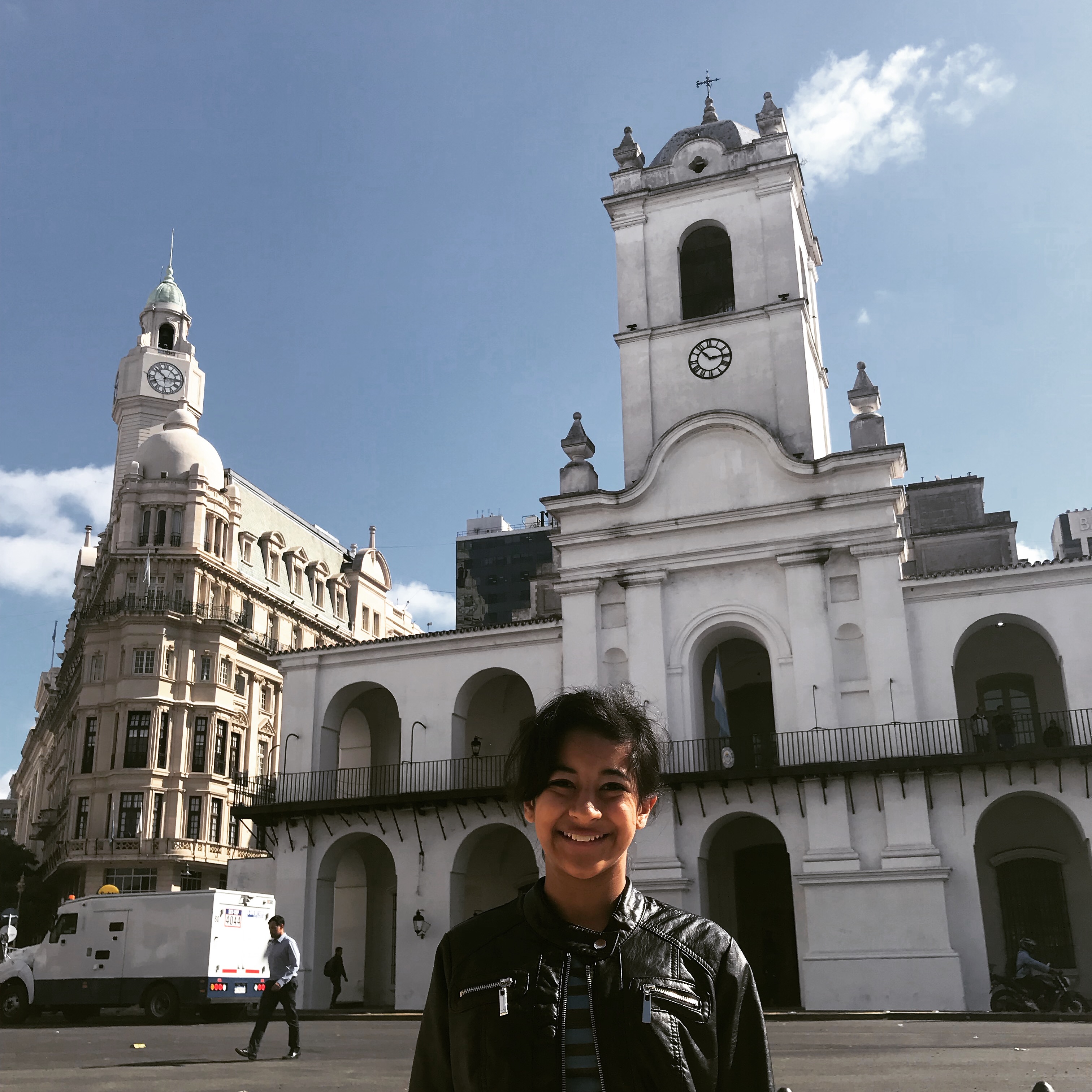 a person standing in front of a building