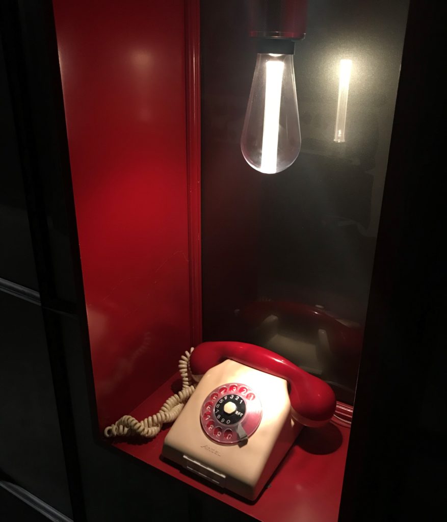 a telephone in a red box
