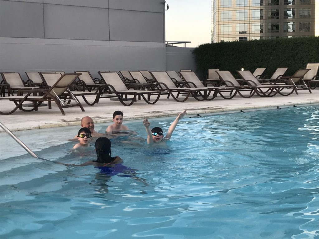 a group of people in a pool