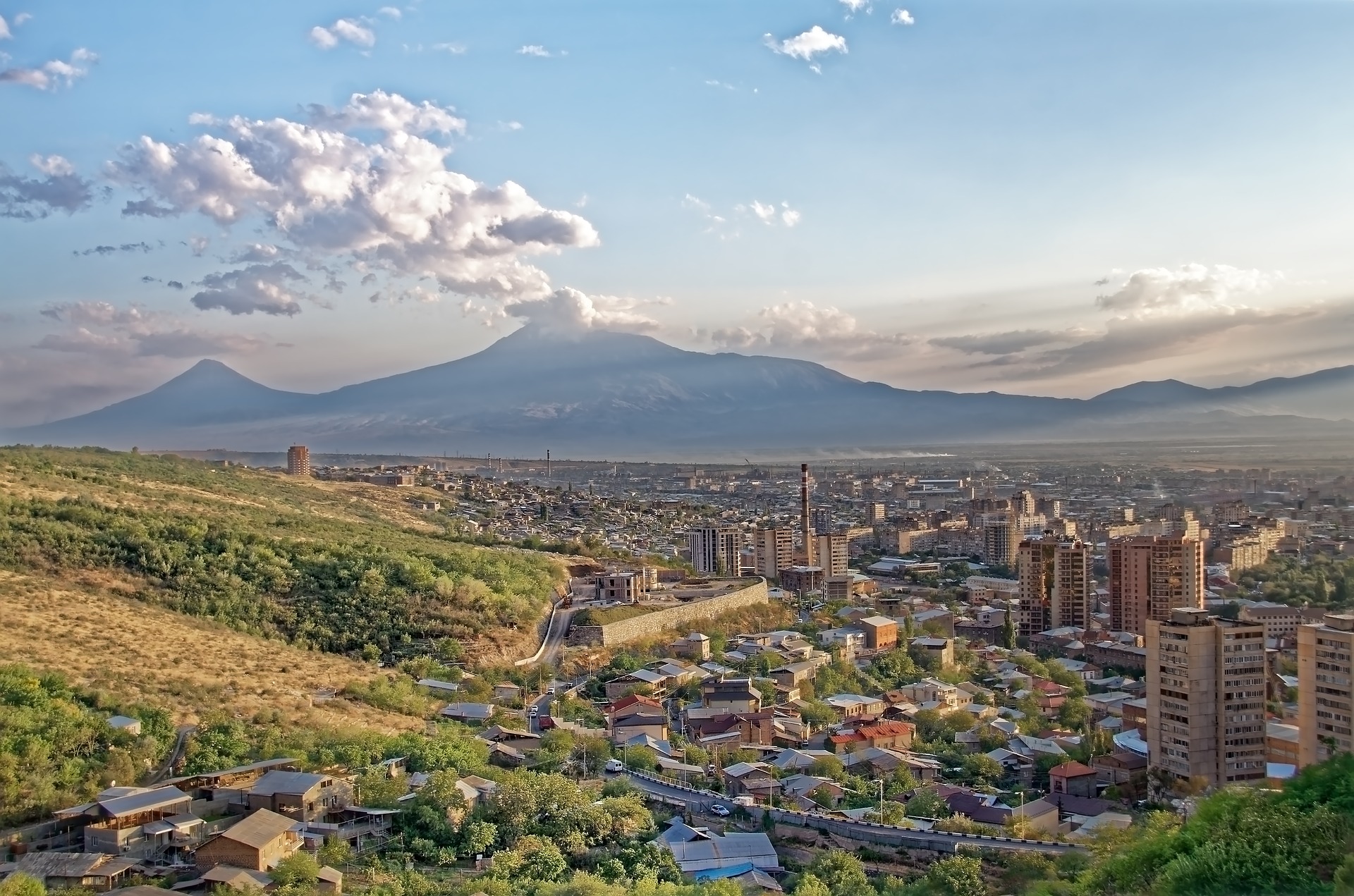 a city with a mountain in the background