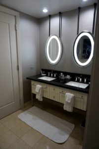 a bathroom with a mirror and sinks