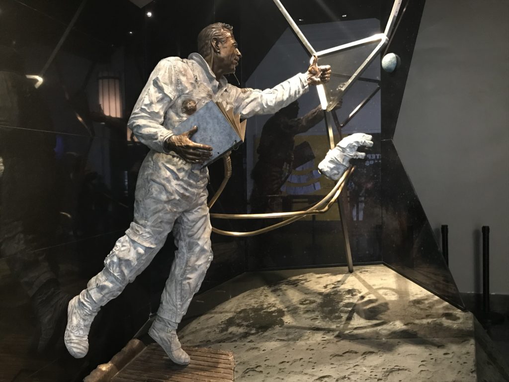 a statue of a man in a space suit