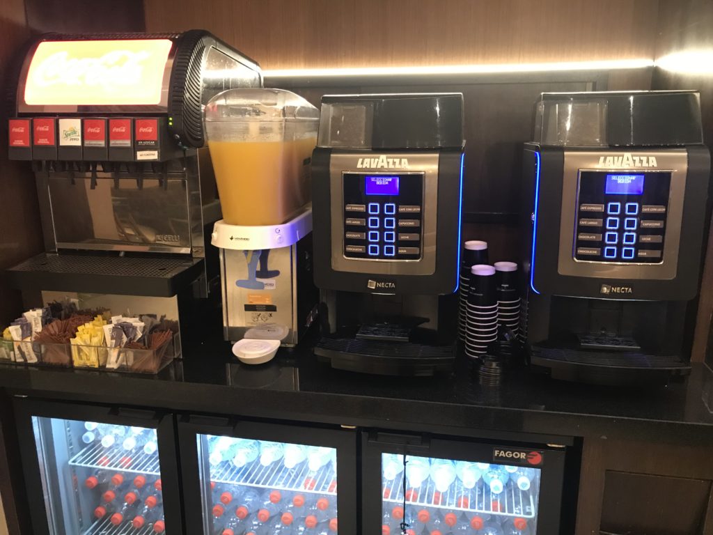a group of coffee machines on a counter