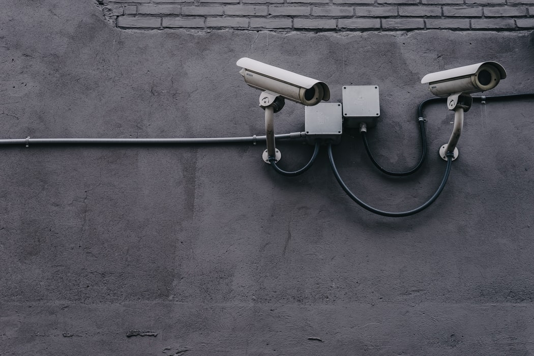 a group of cameras on a wall