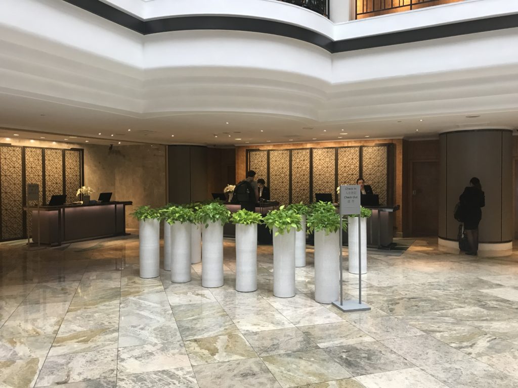 a lobby with a marble floor and a marble floor