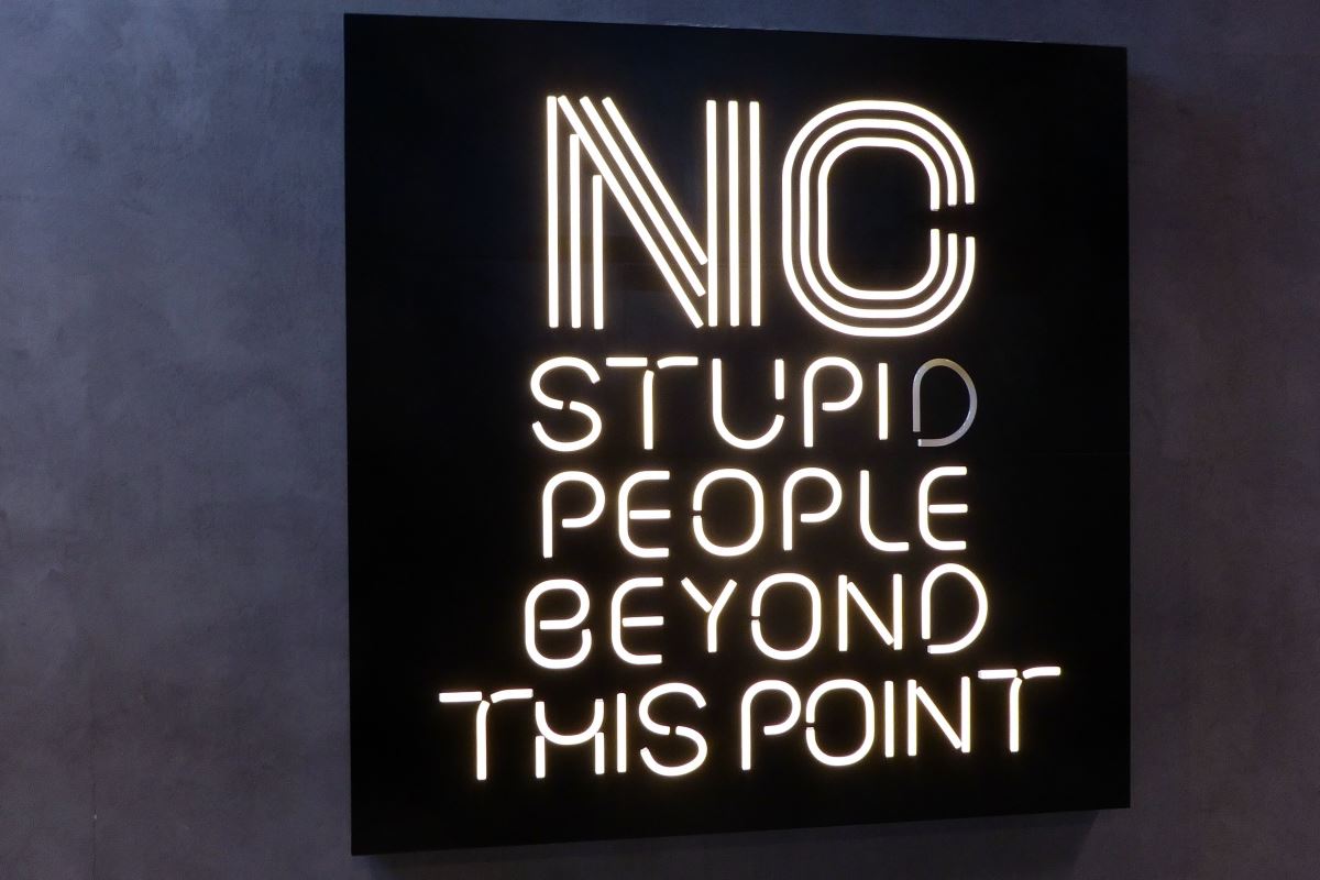 No stupid people beyond this point sign