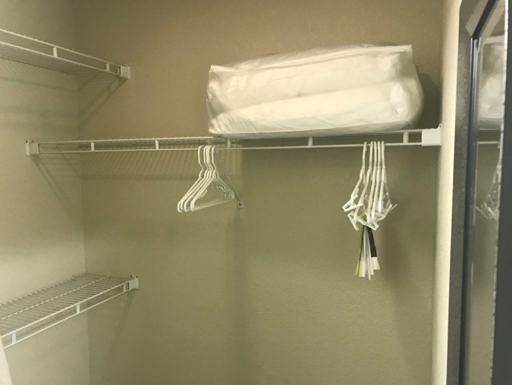 a white swingers and a white sheet on a rack