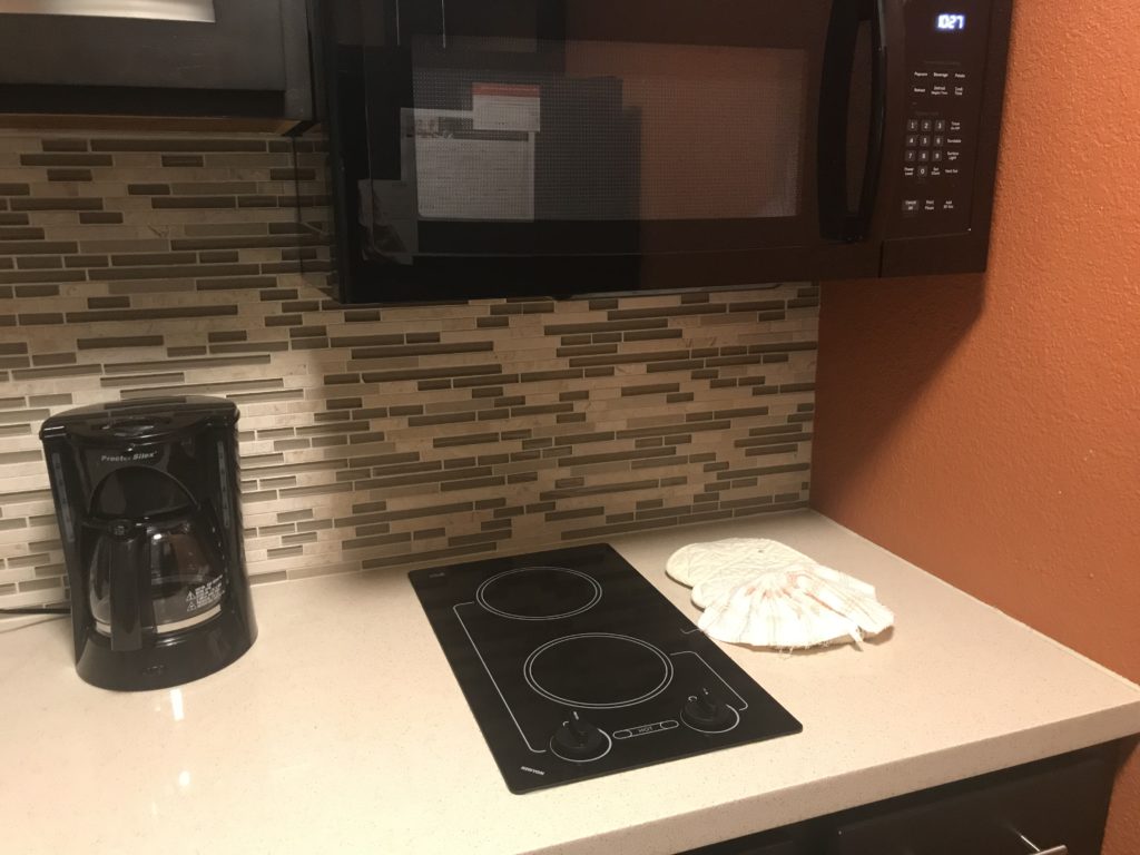 a microwave and oven on a counter