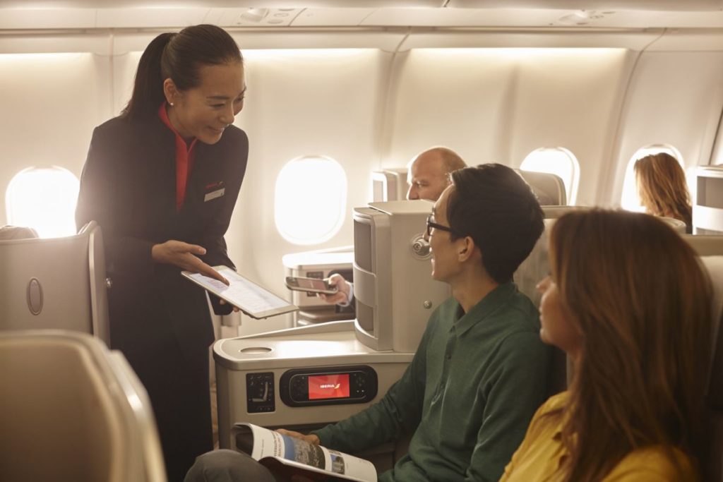 return flights in business class on Iberia