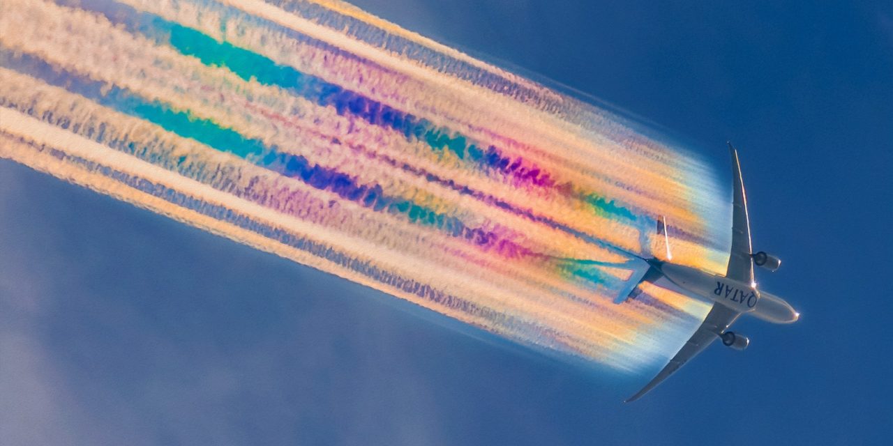 Ever seen anything like these beautiful rainbow contrails?