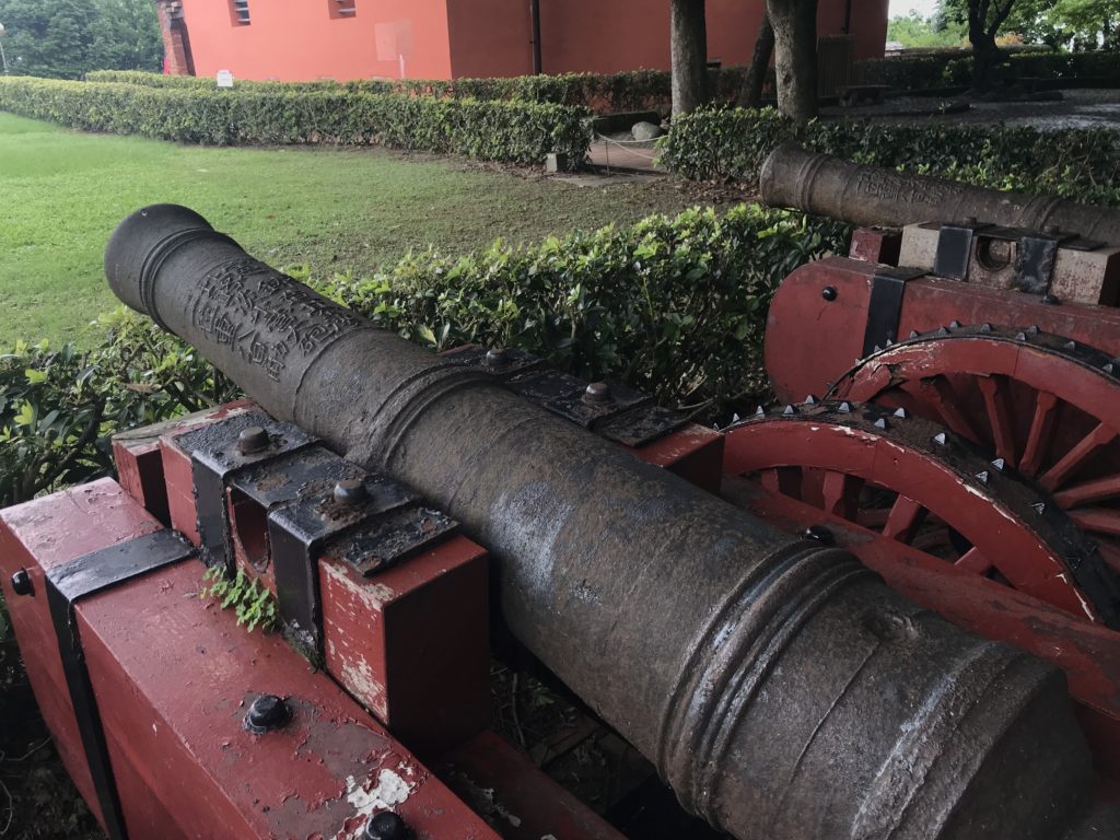 a cannon on a red object