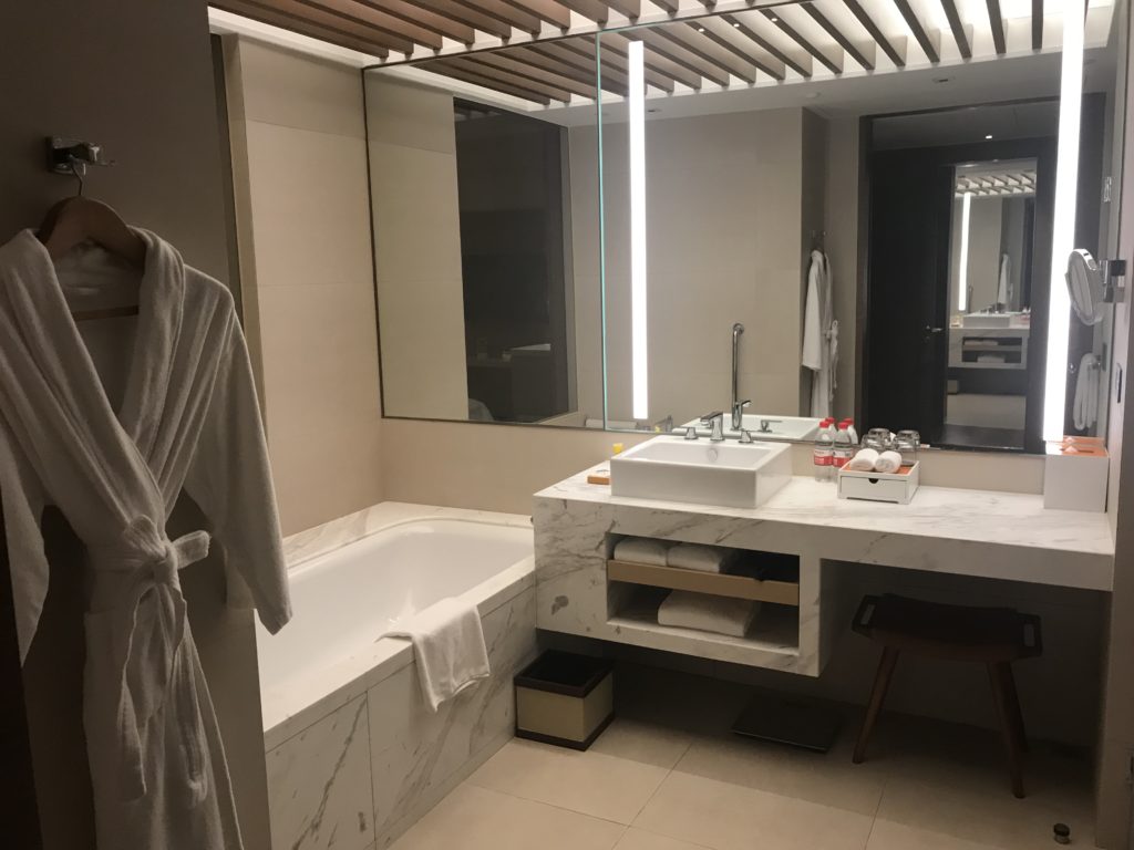 a bathroom with a bathtub and a bathtub