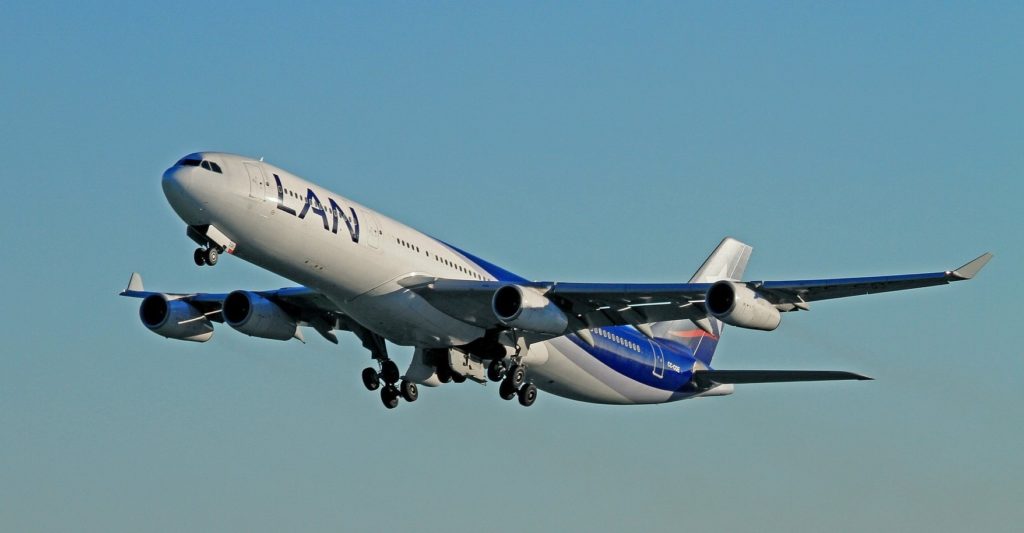 a large airplane flying in the sky