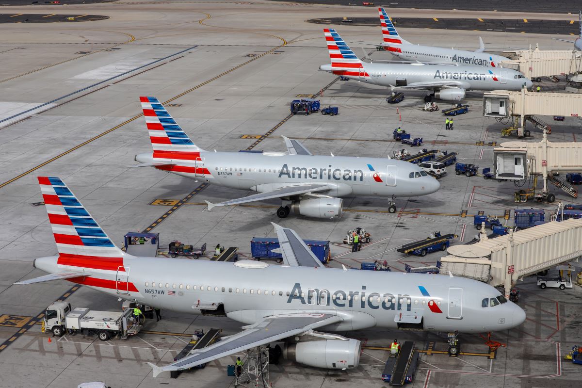 airplanes parked on a runway