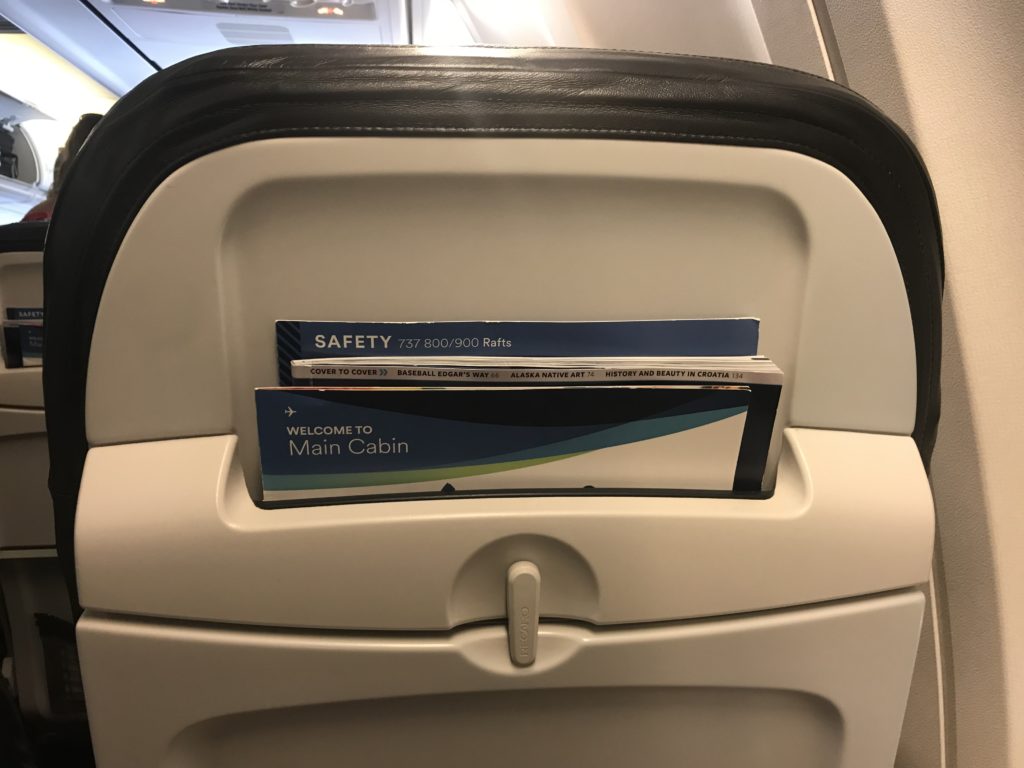 a group of brochures in a seat
