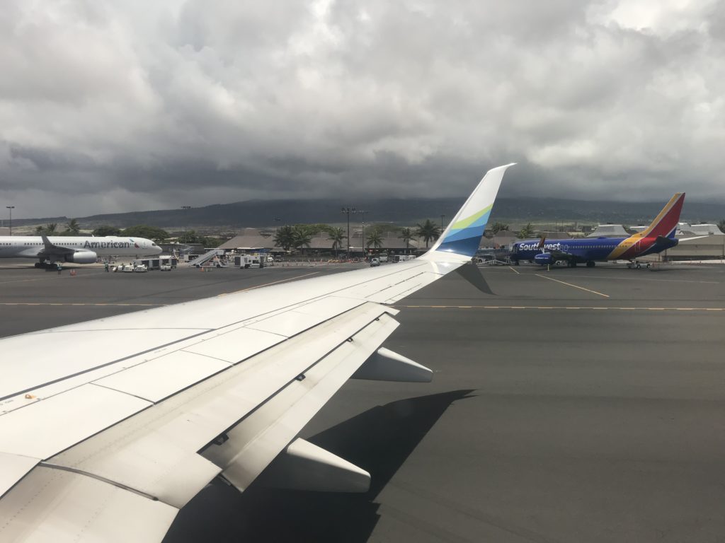 an airplane wing on a runway