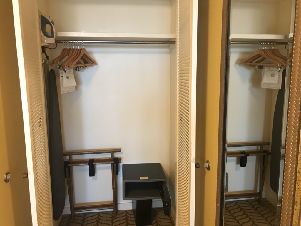 a closet with a table and swingers