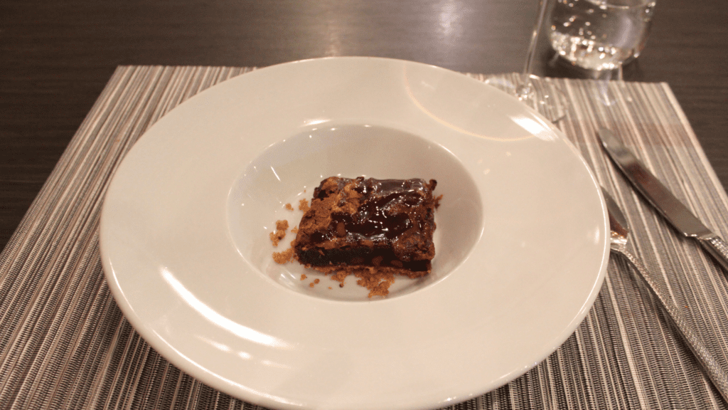 A brownie served as the dessert course