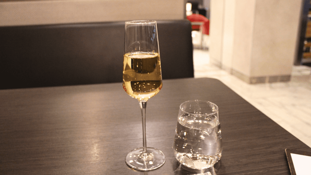 A glass of Krug champagne served at the American Airlines Flagship First Dining Room