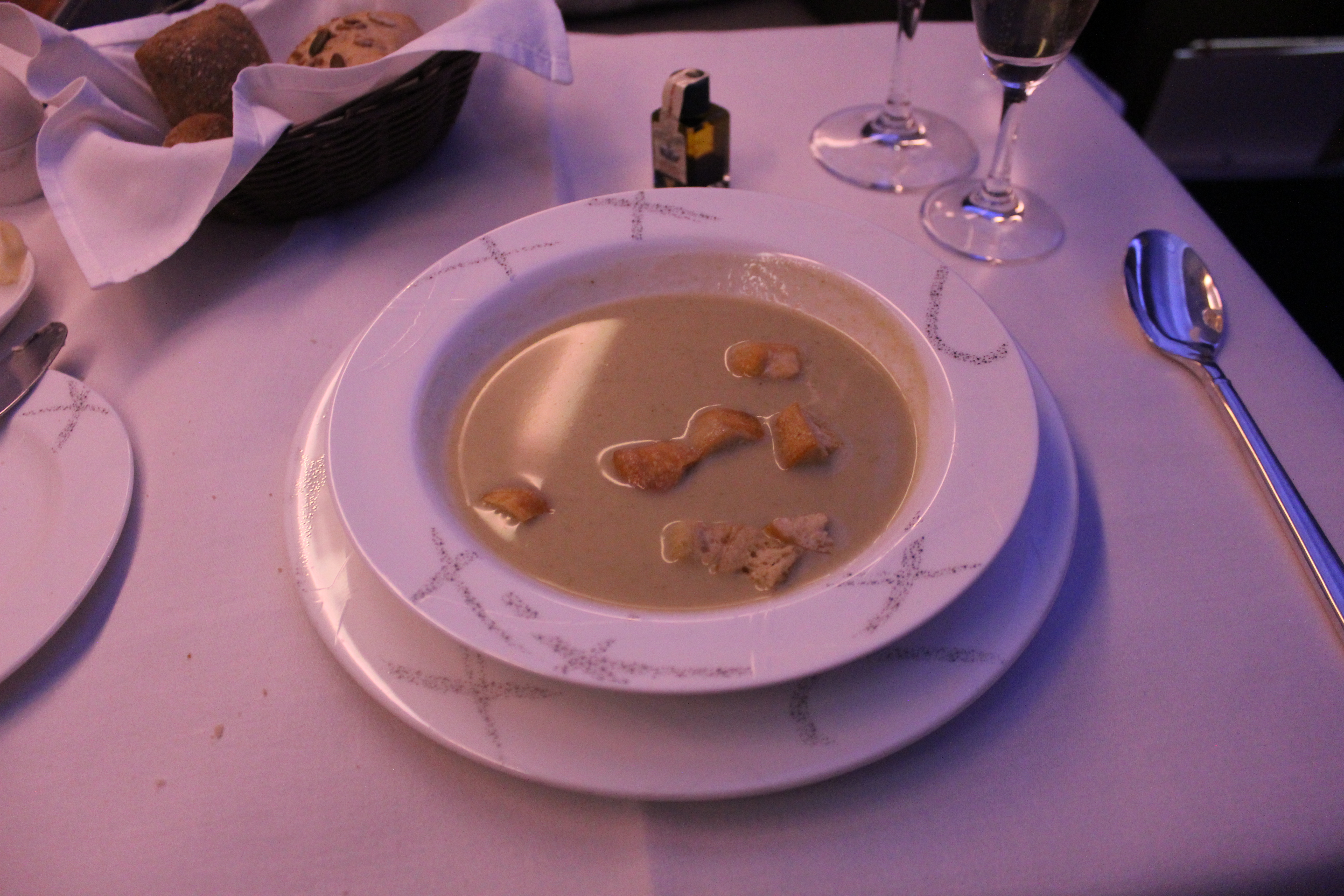 a bowl of soup on a plate