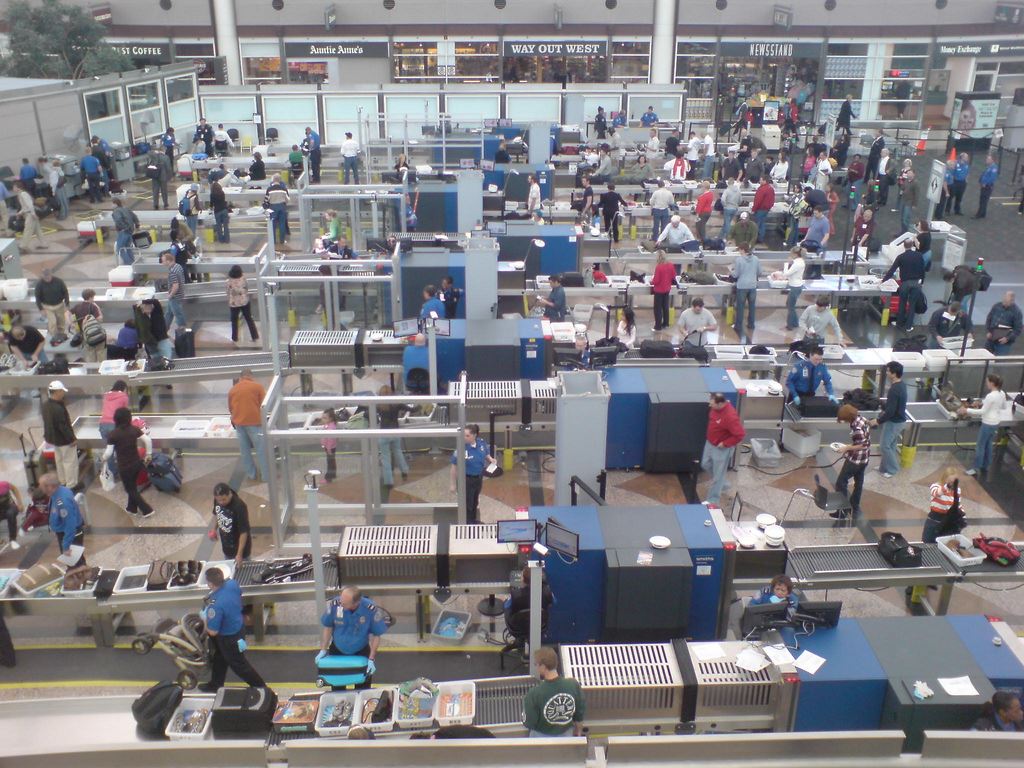 a group of people at an airport