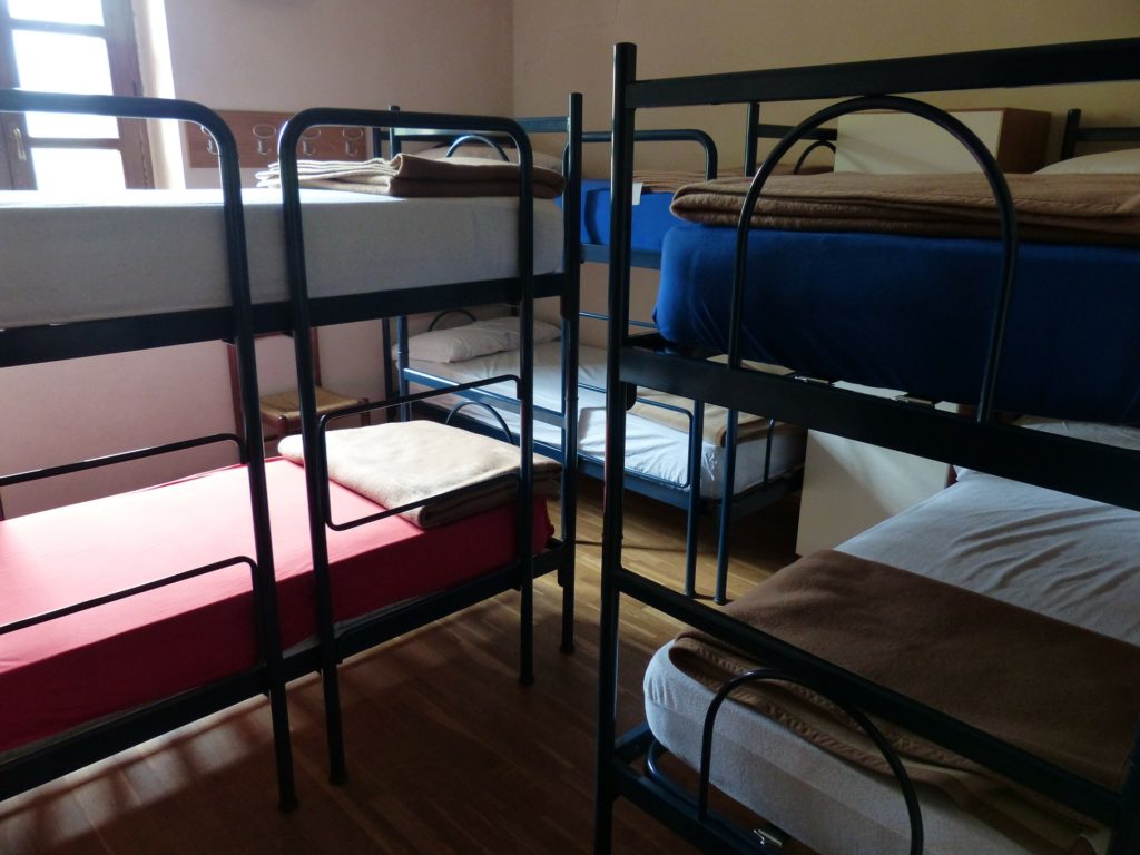 a group of bunk beds in a room