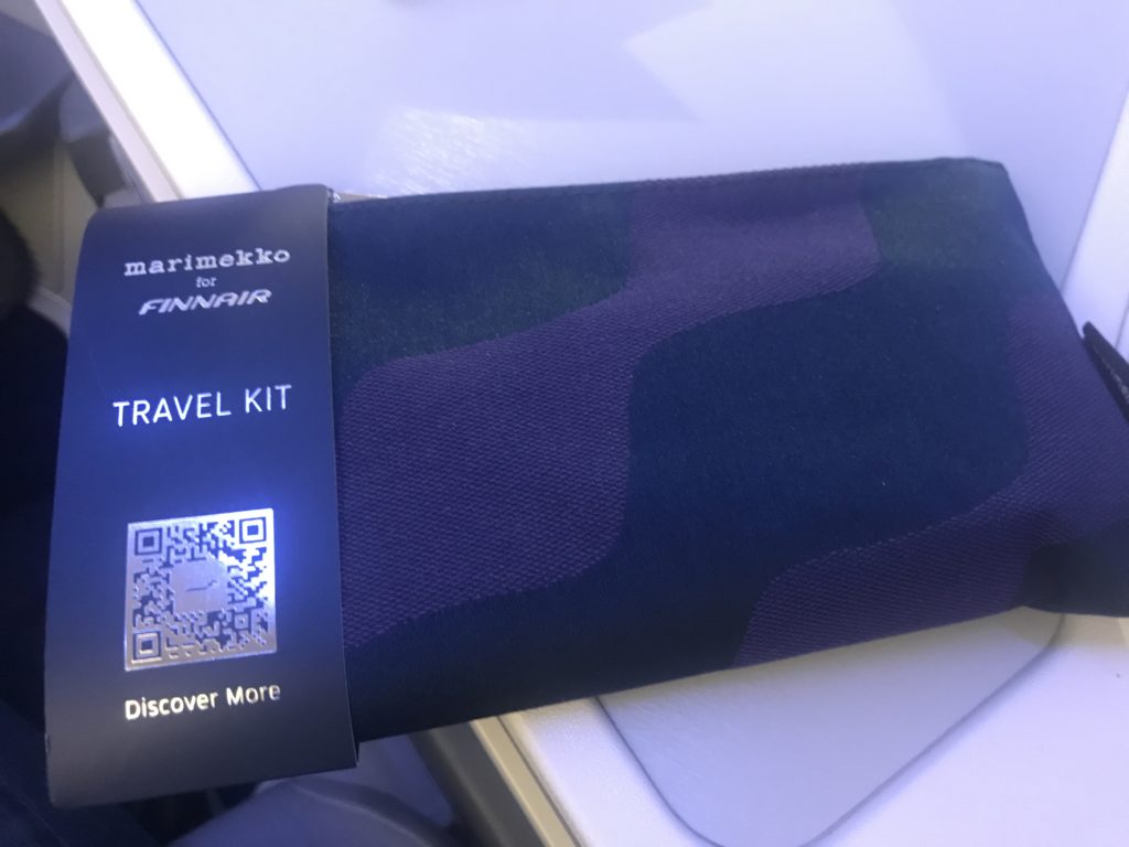 a blue and purple travel kit