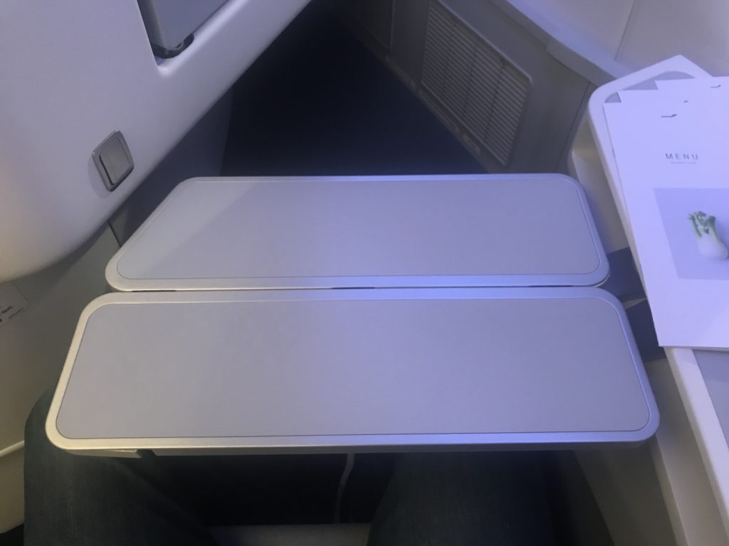 a pair of rectangular white rectangular objects on a seat