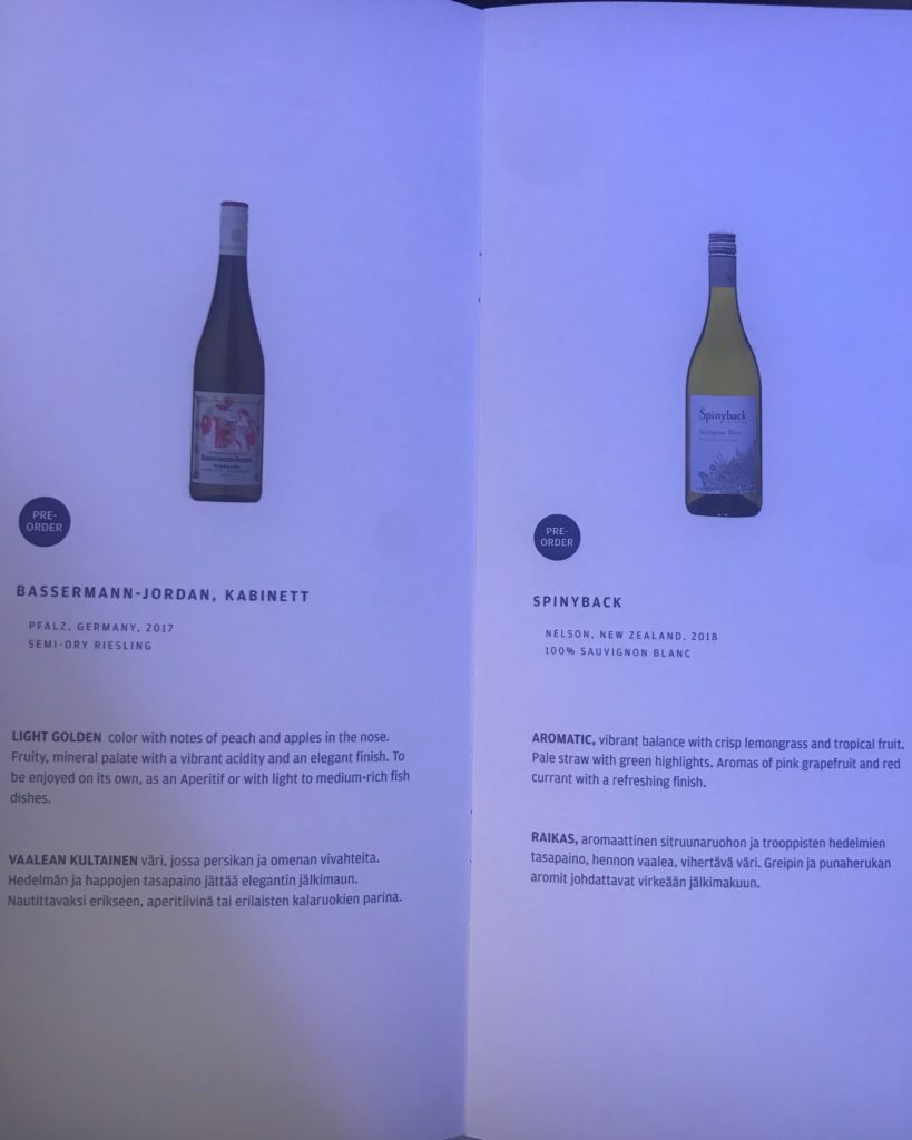 a menu with a picture of wine bottles