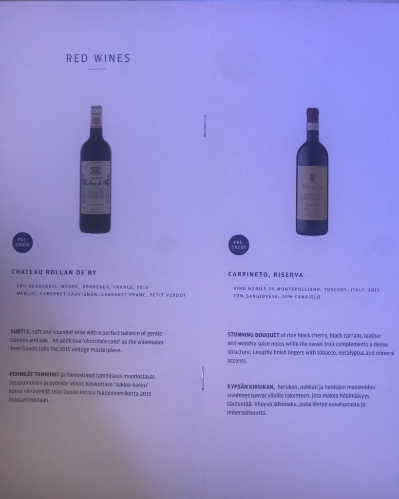 a menu with a picture of wine bottles