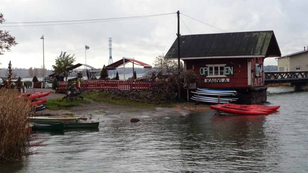 a boat parked next to a building