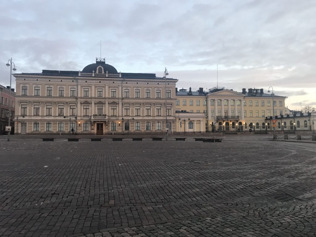 a group of buildings in a plaza