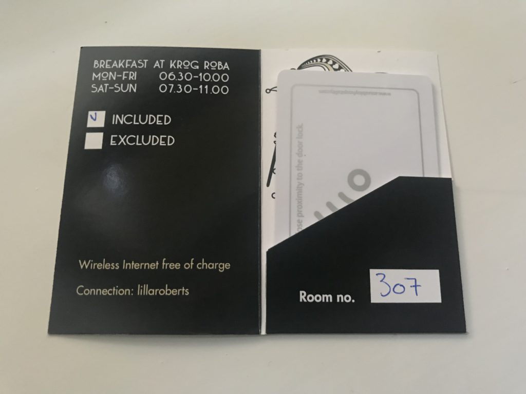 a black and white card with a white label