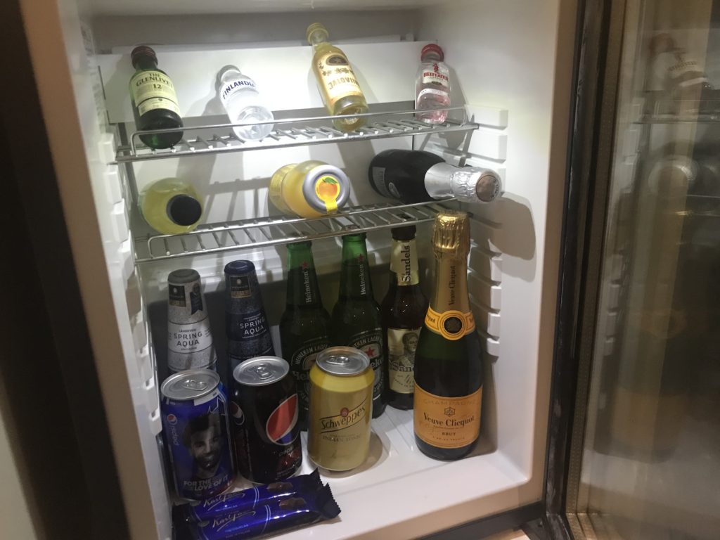 a mini fridge full of drinks